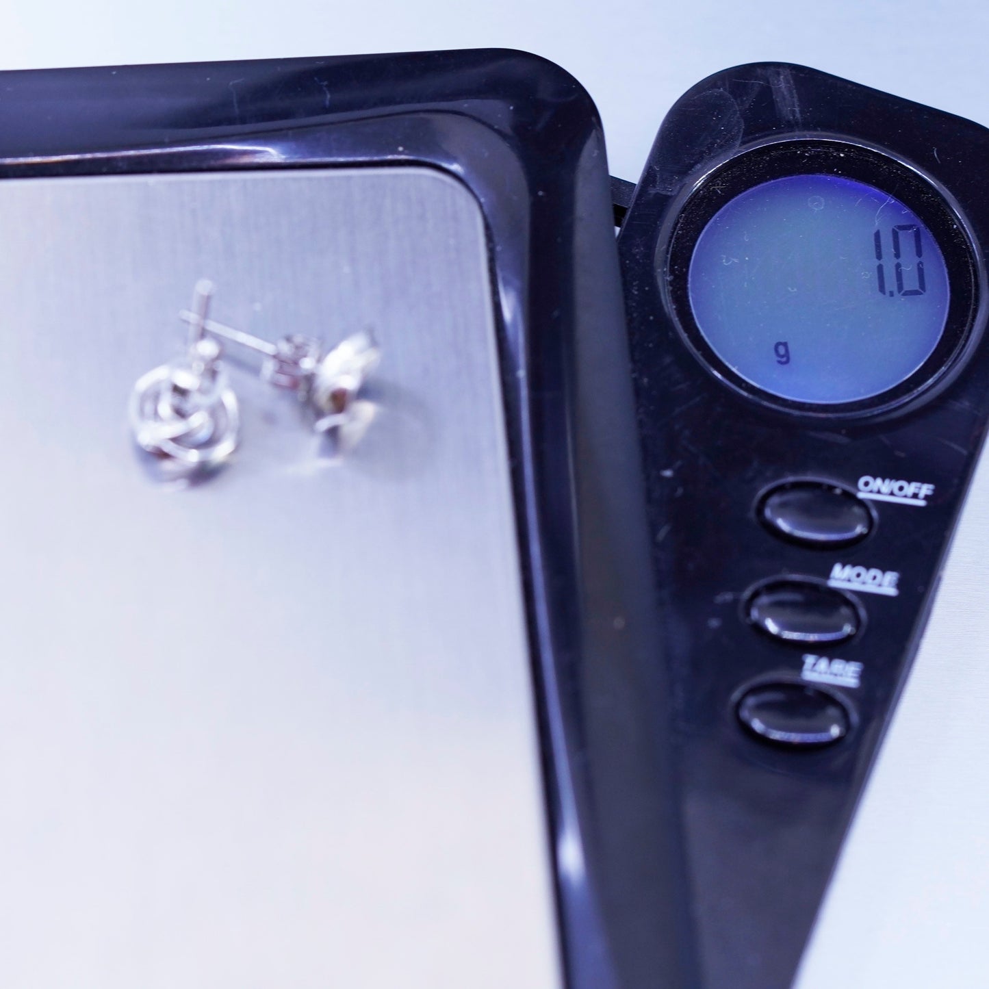 Vintage Sterling 925 silver earrings, entwined studs with cz inlay