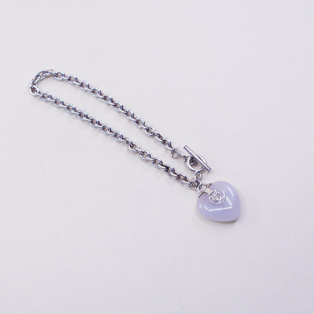 6.75”, sterling 925 silver circle bracelet w/ heart jade charm and “love”