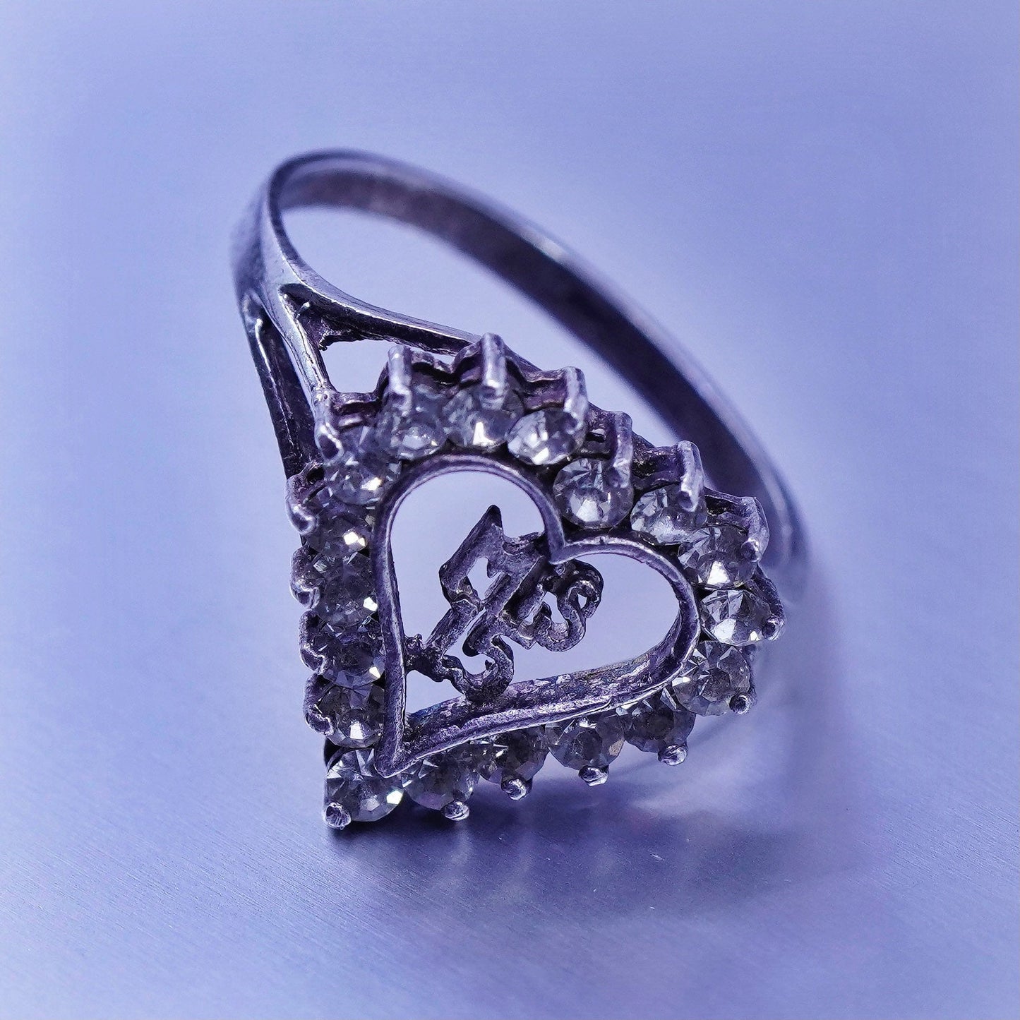 Size 7.5, vintage Avon Sterling 925 silver engagement ring with Cz and “mis 15”