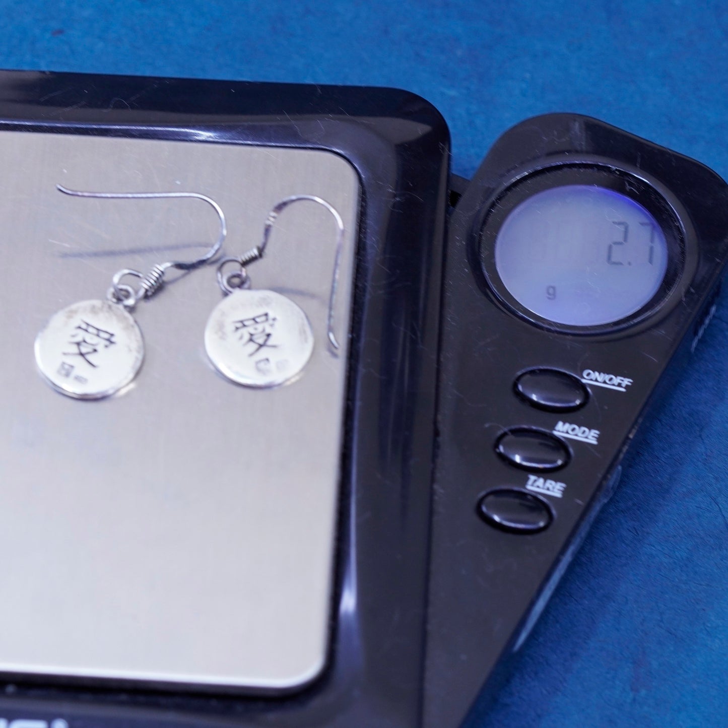 Sterling Silver handmade Earrings. 925 hammered circle disc embossed “love”