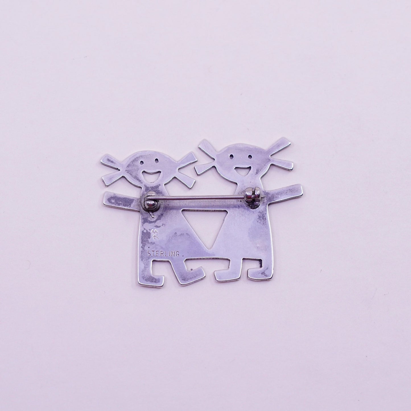 Vintage sterling 925 silver handmade brooch, two girls holding hands