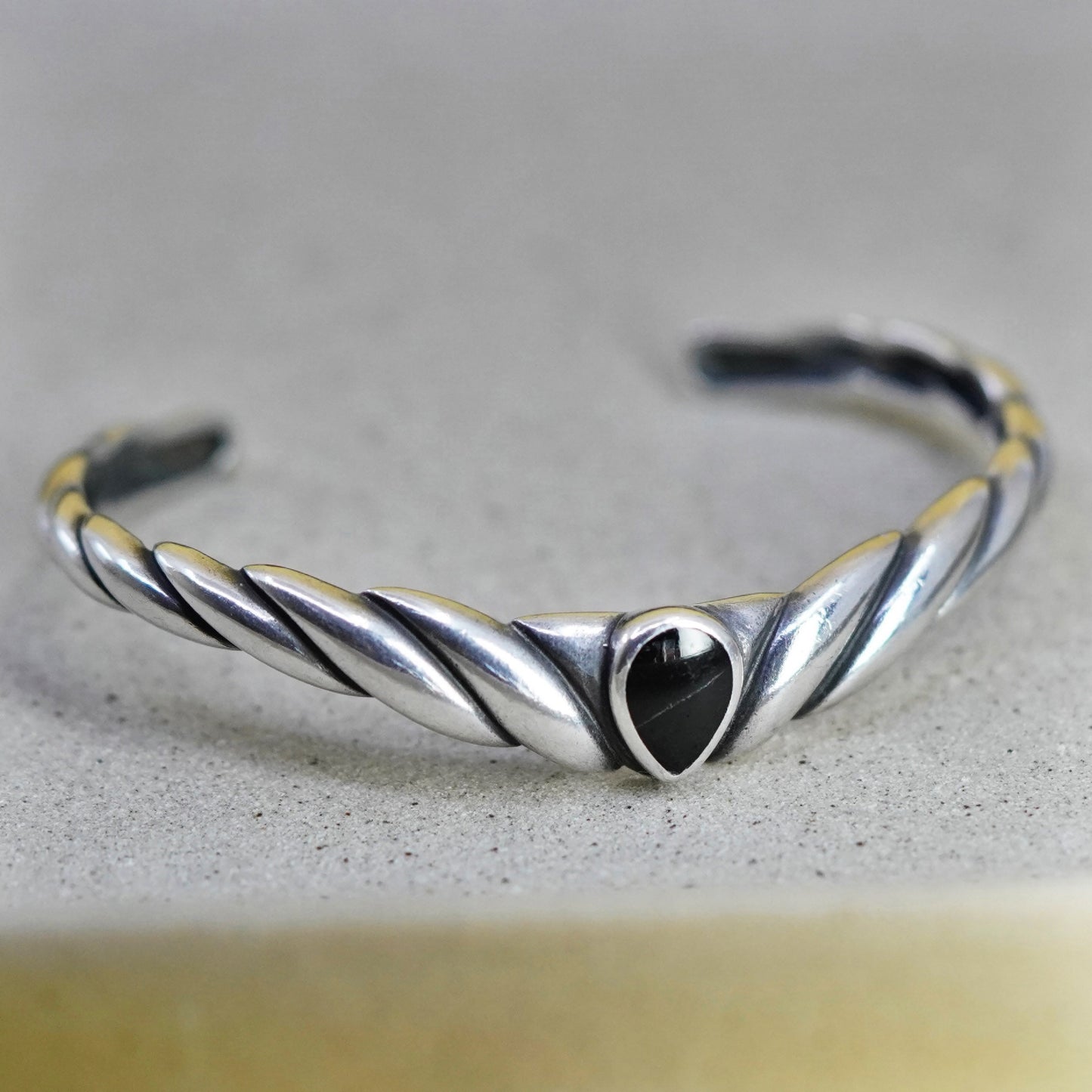 6.5”, Navajo Sterling 925 silver bracelet ribbed cuff with teardrop obsidian