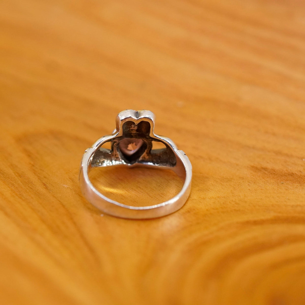 Size 7, Vintage sterling 925 silver claddagh ring, holding pink Cz heart band