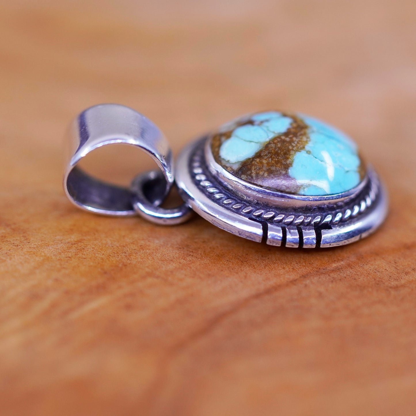 Vintage Benny Pinto Sterling silver pendant with oval cripple creek turquoise