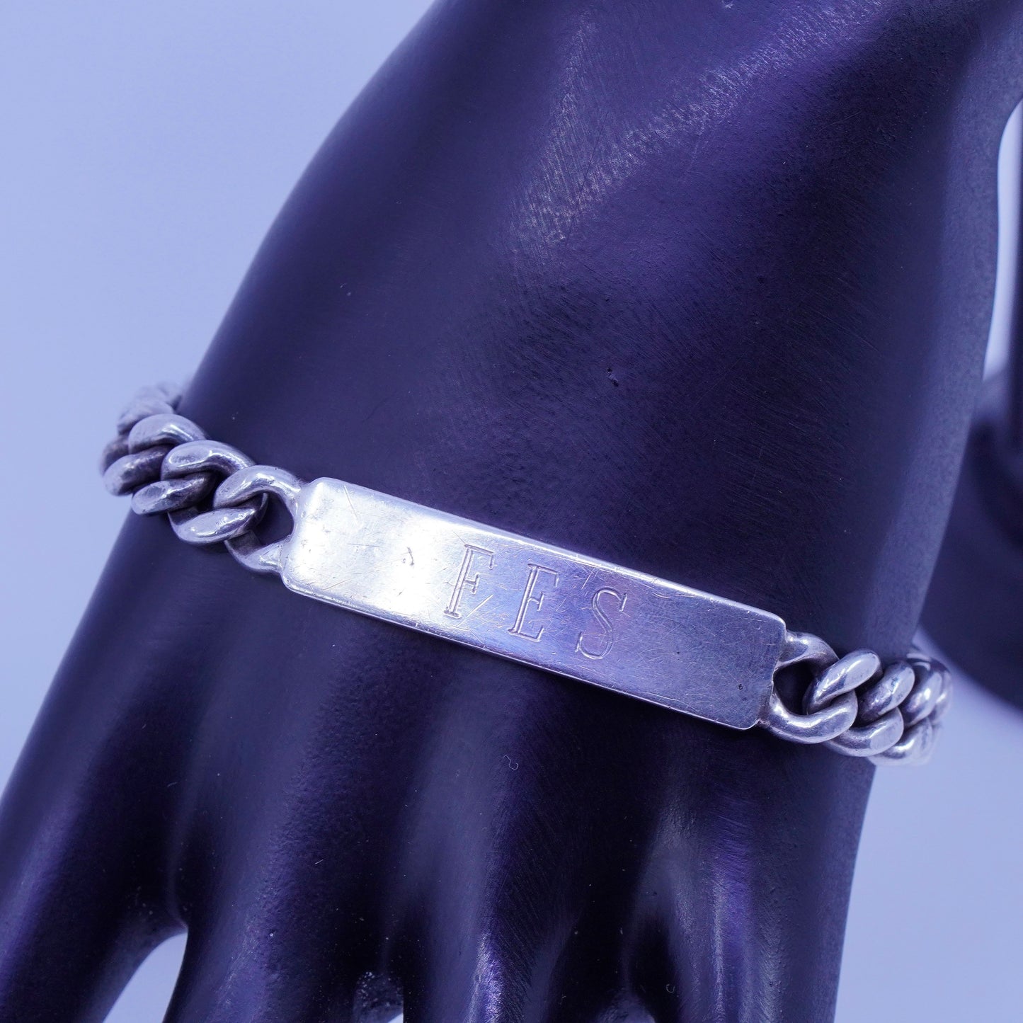 7.5”, doskow Sterling silver bracelet, 925 curb chain name tag engraved “FES”