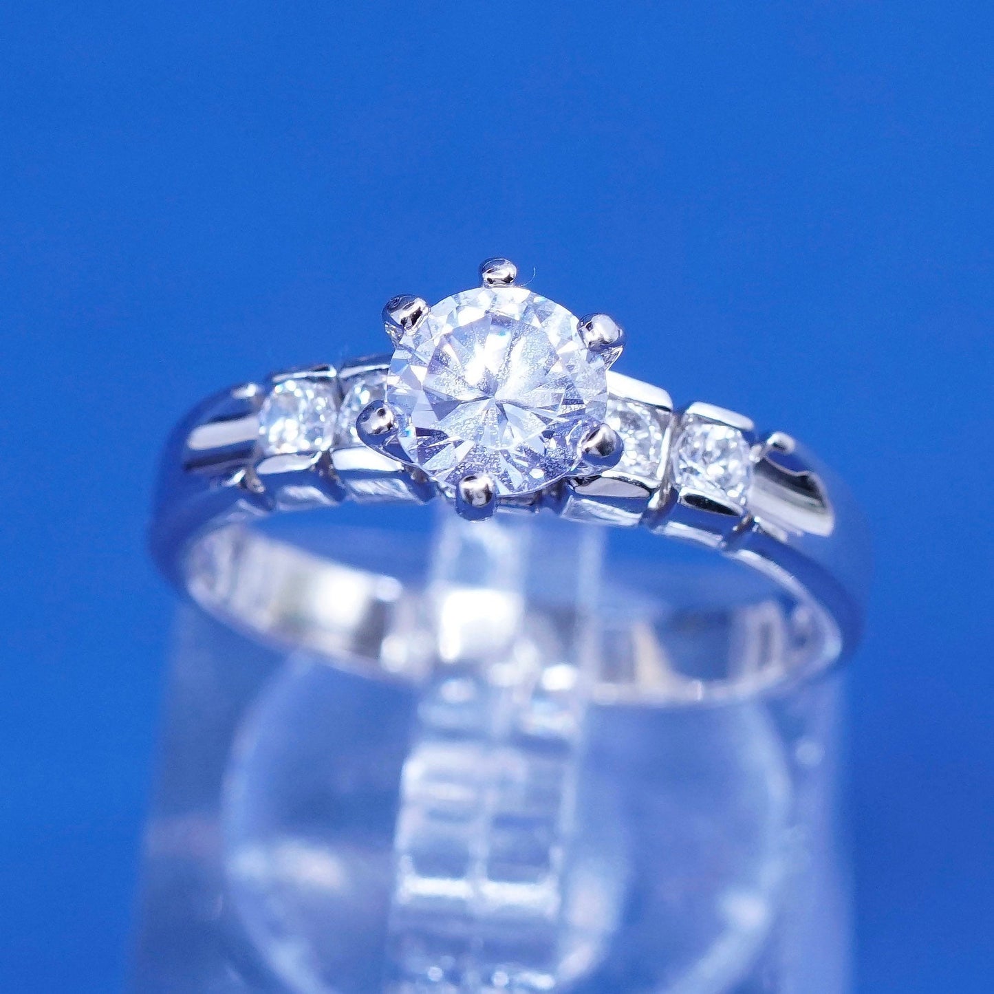 Size 7.25, vintage Sterling 925 silver engagement ring with clear cz stones