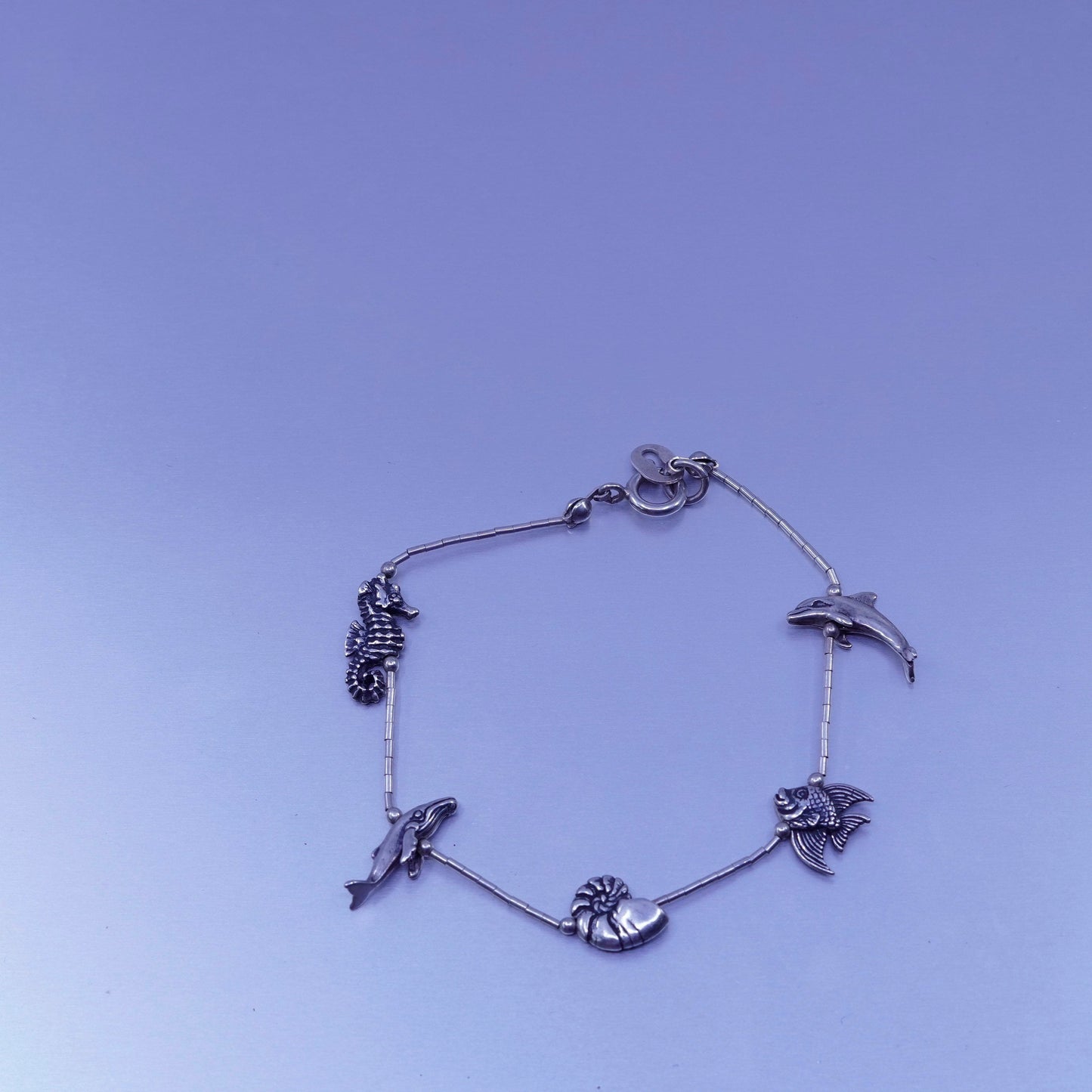 7.25”, Sterling 925 silver bracelet, liquid chain seahorse whale dolphin charm