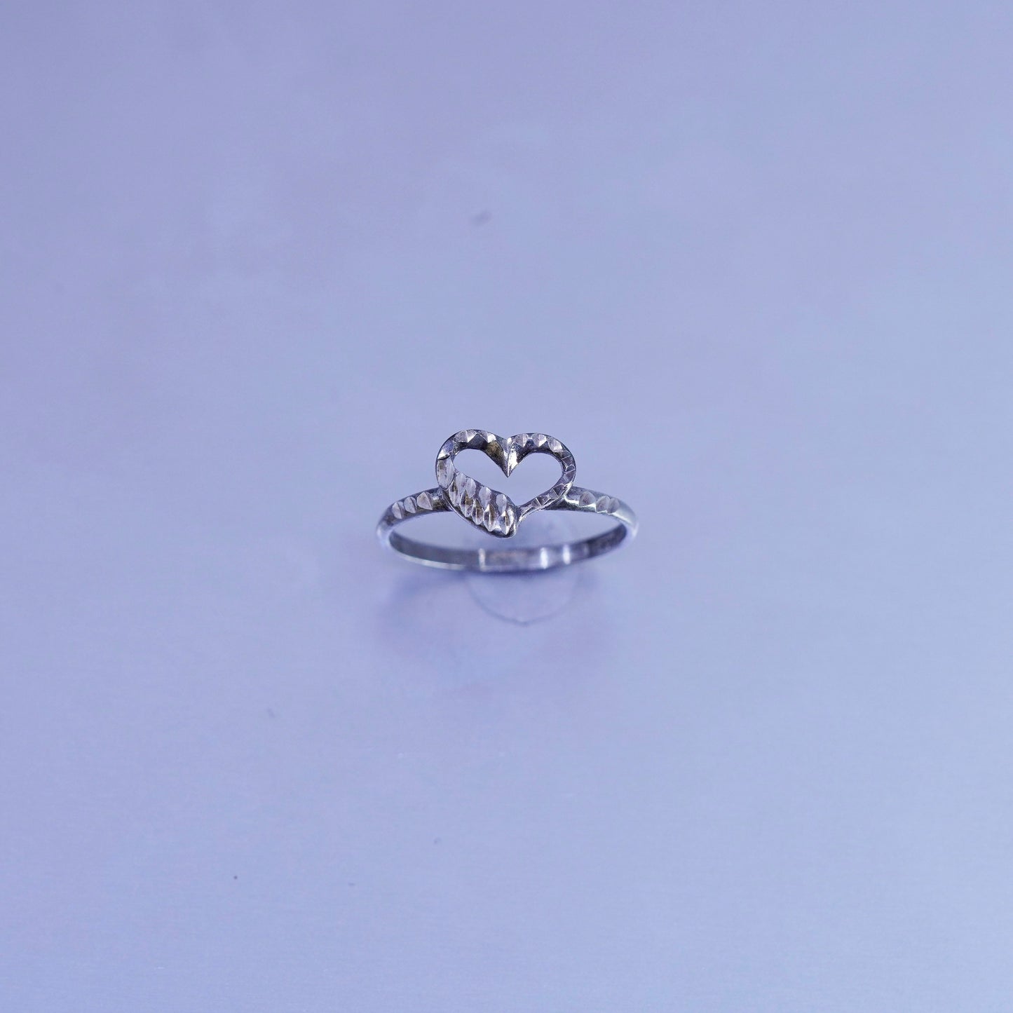 Size 4.5, southwestern Sterling 925 silver wedding ring, heart stackable band