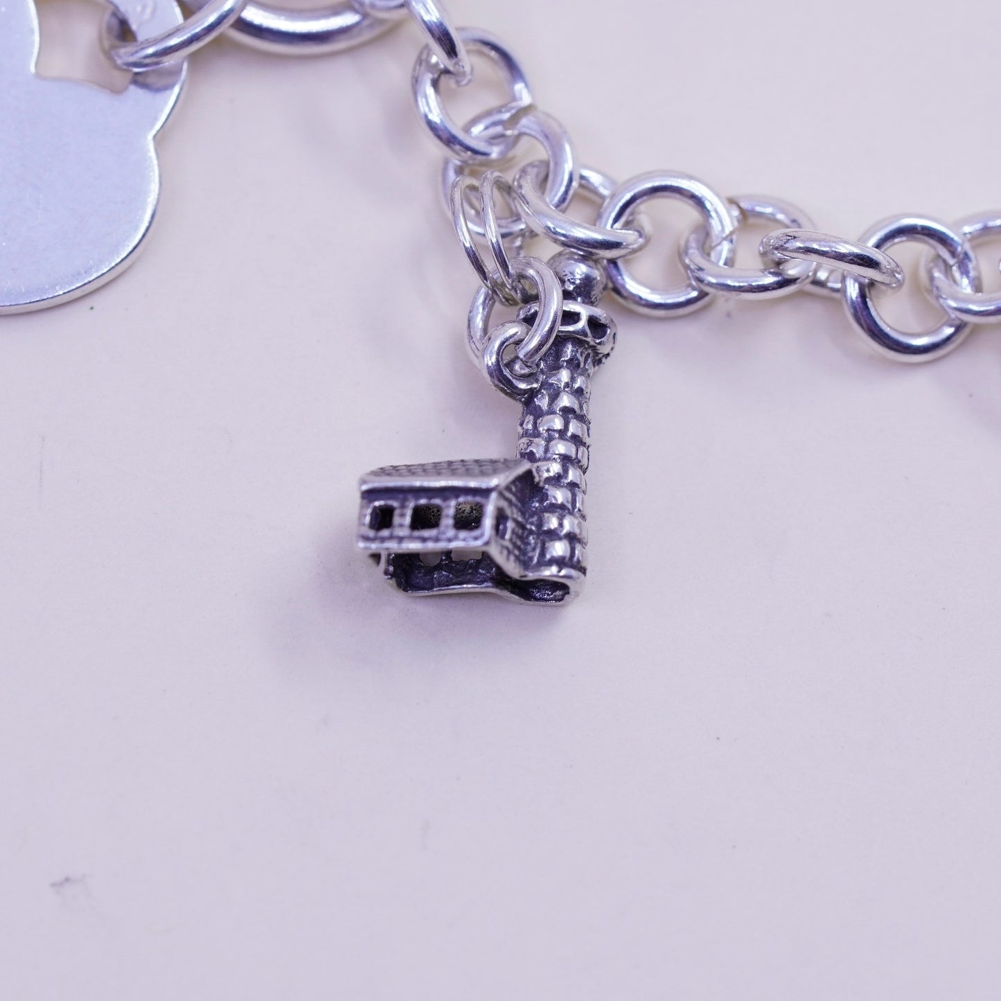 6.75” sterling silver bracelet, bold circle chain heart bible cross piano