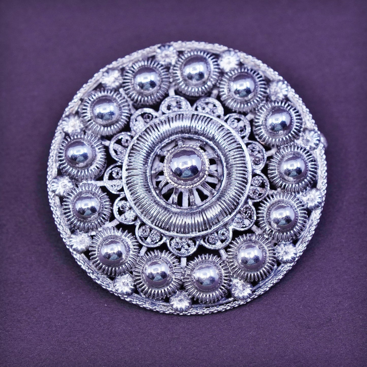 Vintage handmade sterling silver round shaped filigree bead brooch