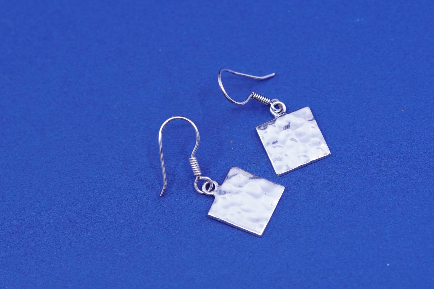 Vintage Sterling Silver handmade Earrings. 925 hammered tag dangles