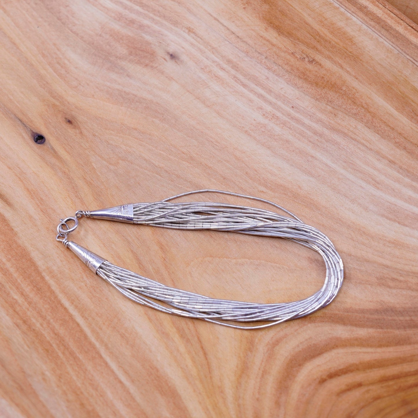 6.75”, vtg Sterling 925 handmade bracelet, 20 multi strands liquid Silver chain