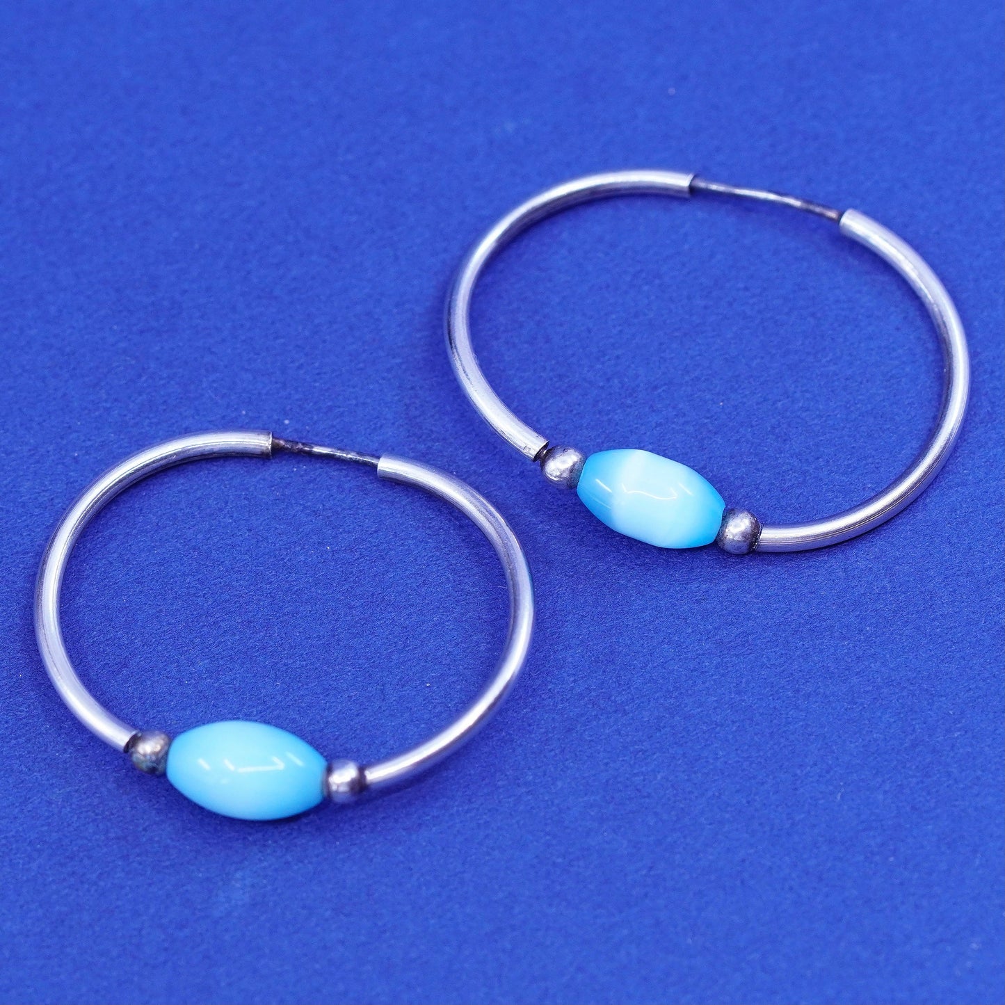 1.25”, vtg Sterling silver handmade earrings, 925 hoops huggie blue cats eye
