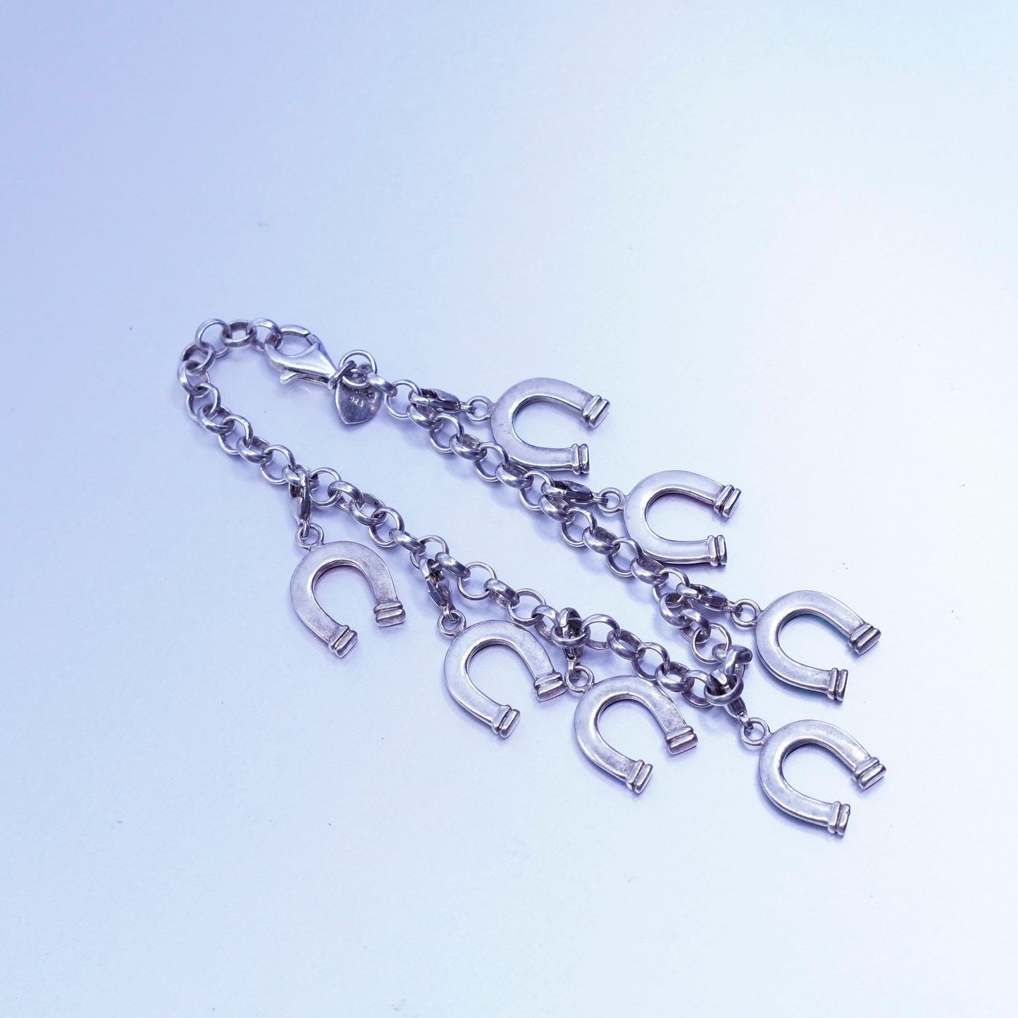 7.25”, Hidalgo jewelry Sterling 925 silver bracelet, chain horseshoe charms