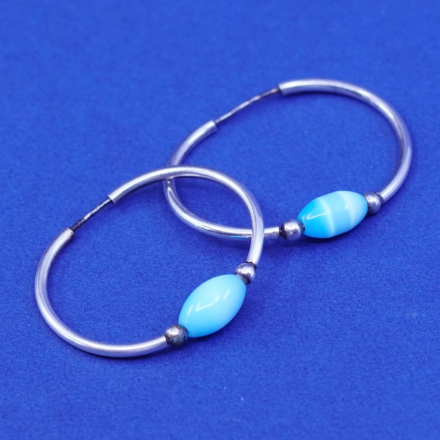 1.25”, vtg Sterling silver handmade earrings, 925 hoops huggie blue cats eye