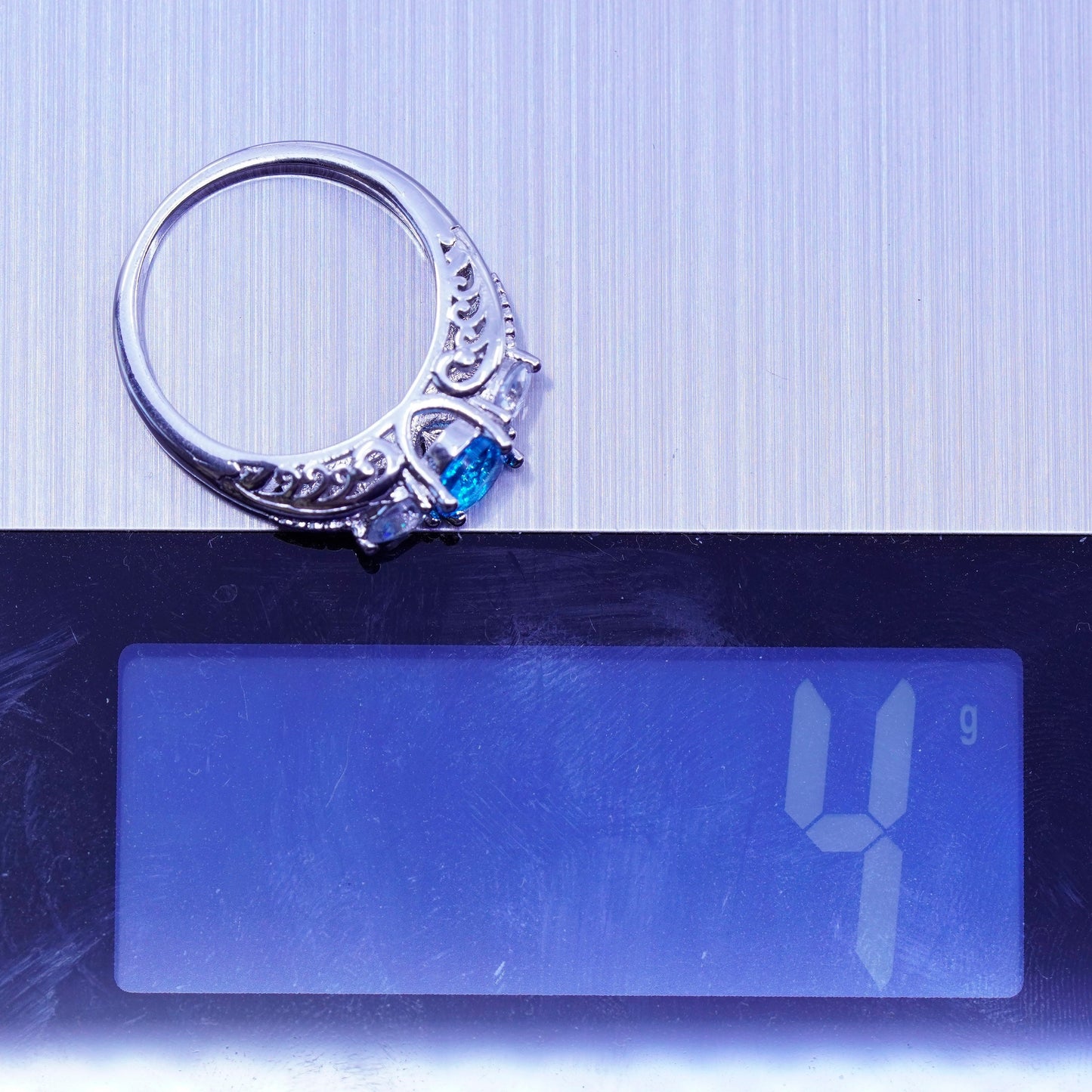 Size 7.75, vintage Sterling 925 silver handmade filigree ring with blue Cz