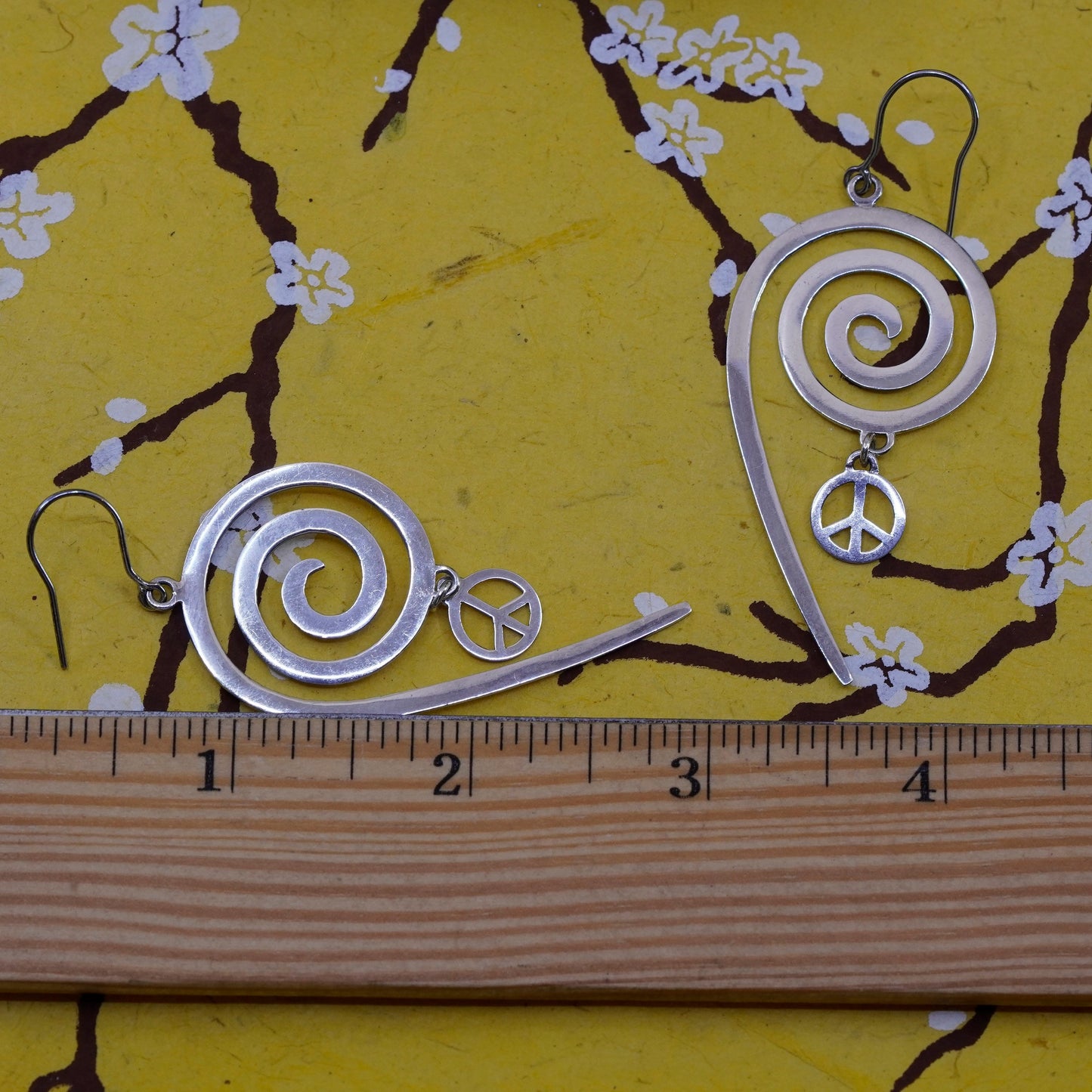 Vintage Sterling 925 silver handmade earrings with swirly peace CND charm