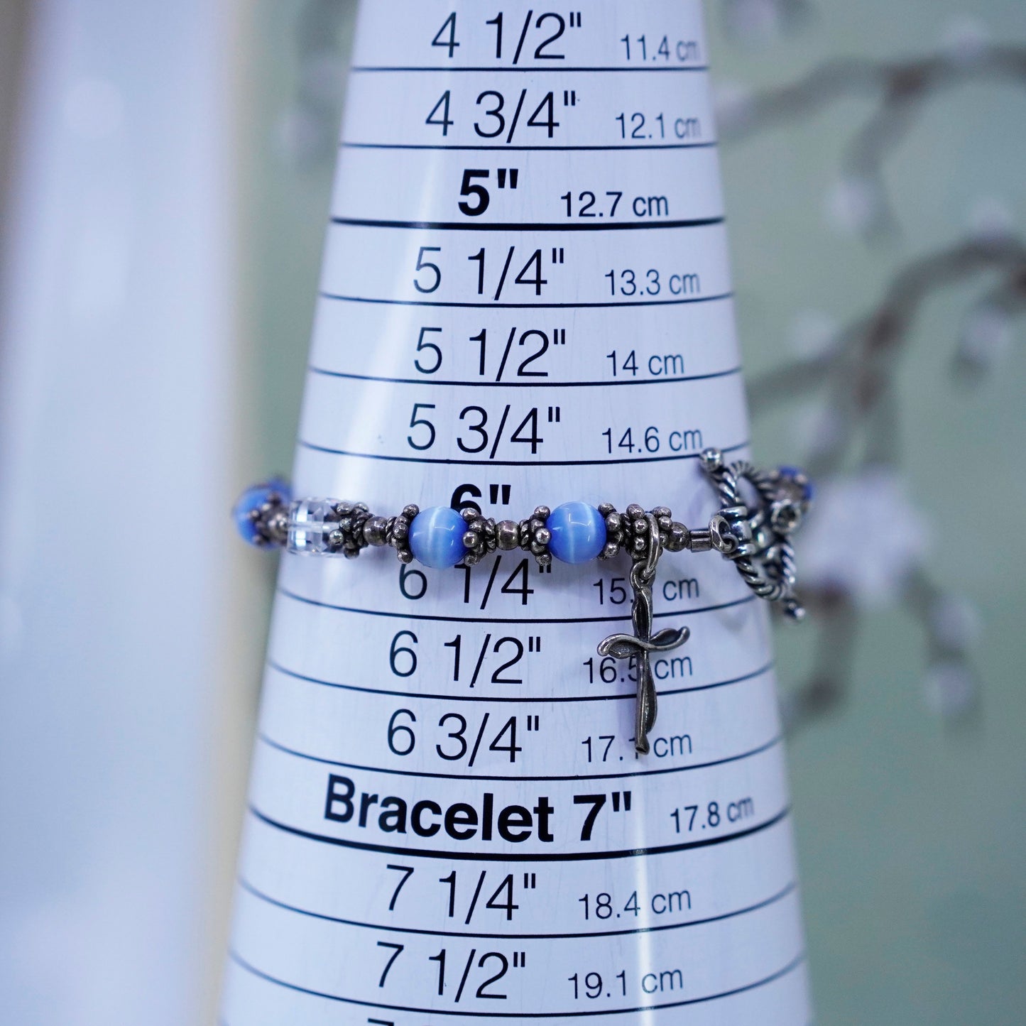 6”, Mexico 925 sterling silver bracelet with blue cats eye bead and cross charm