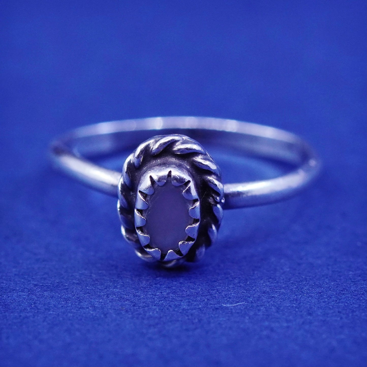 Size 4, southwestern Sterling 925 silver handmade ring with mother of pearl