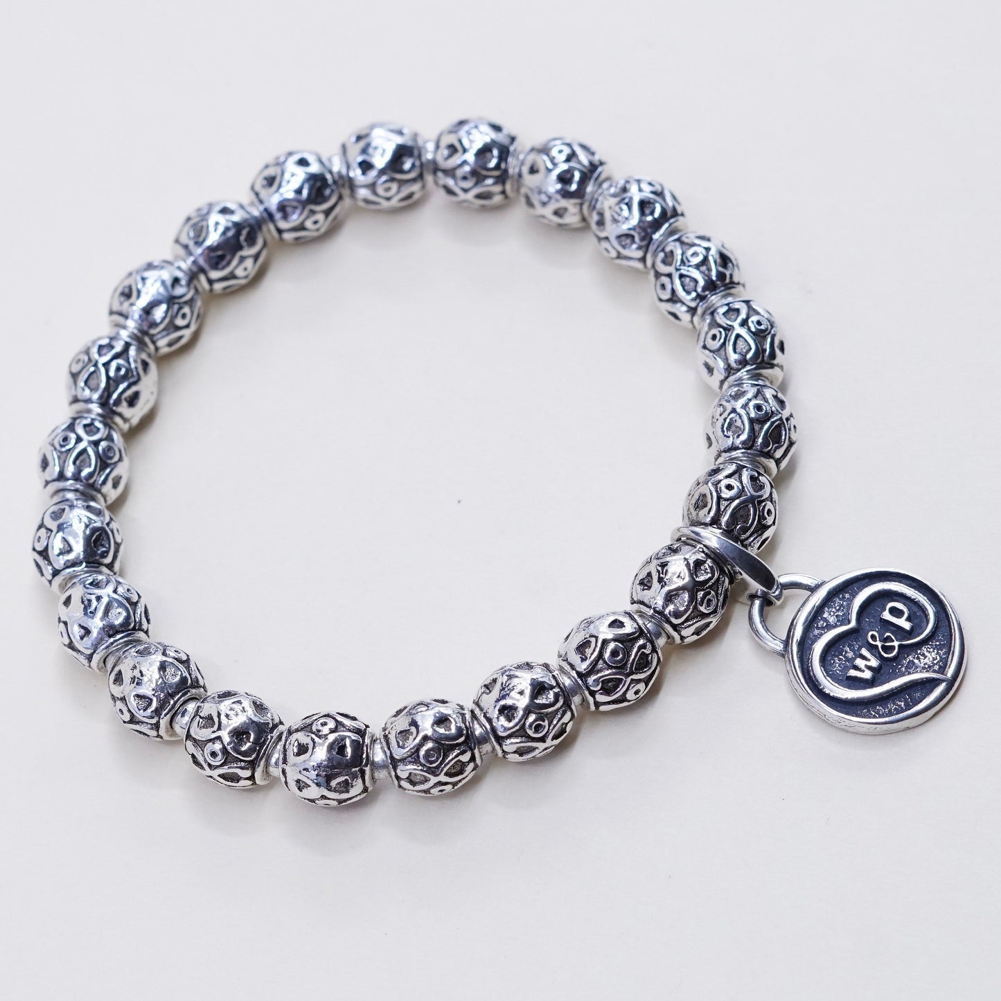 6.75”, sterling 925 silver handmade elastic bracelet textured beads N ASU charm
