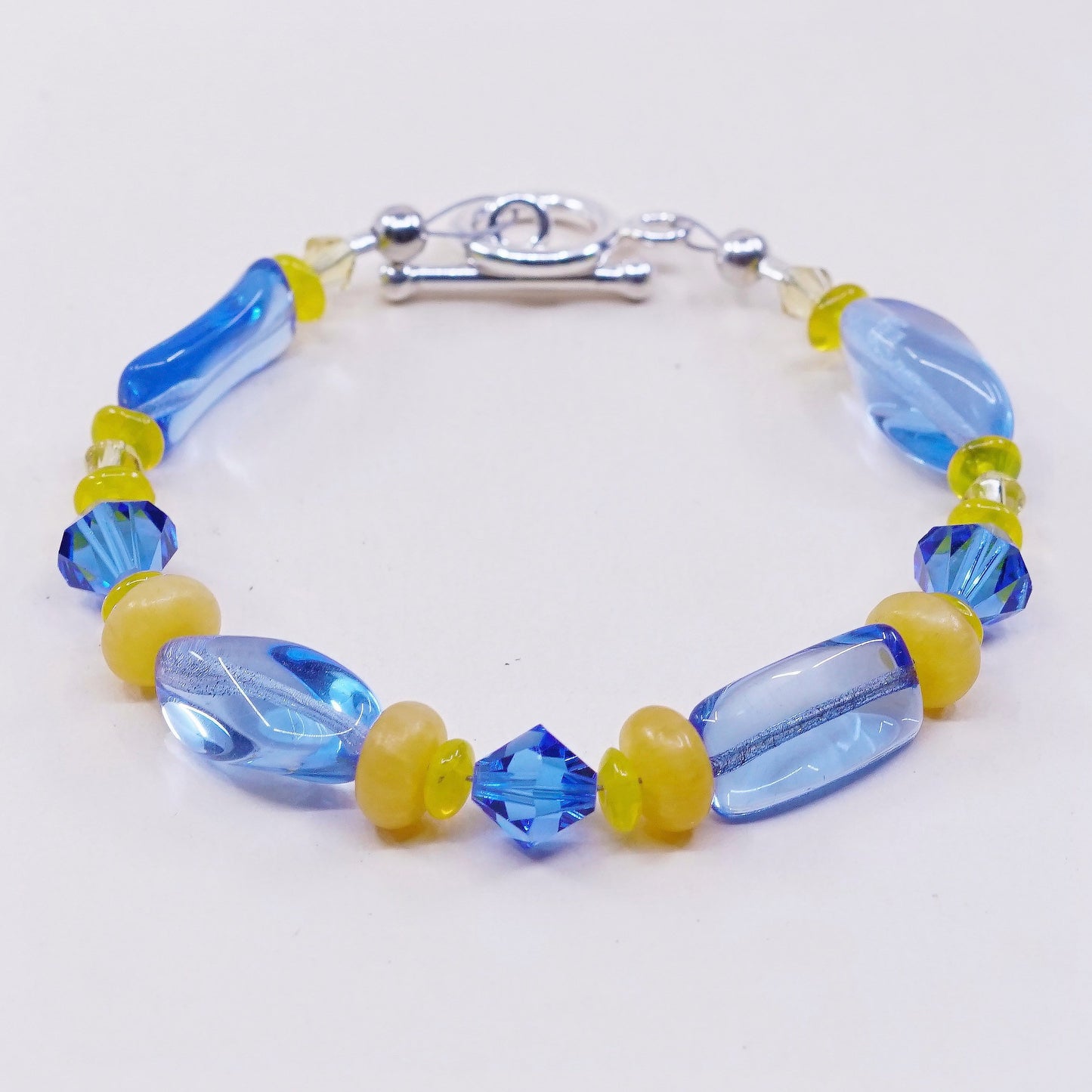 6.25”, vtg 925 Sterling silver beads bracelet w/ artisan blue beads N toggle