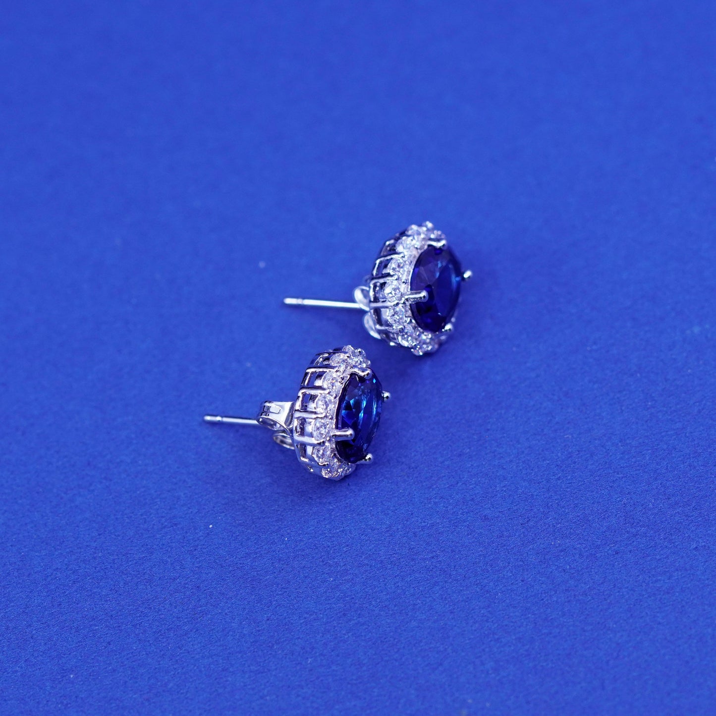 Vintage sterling silver handmade earrings, 925 studs w/ cluster Cz and sapphire
