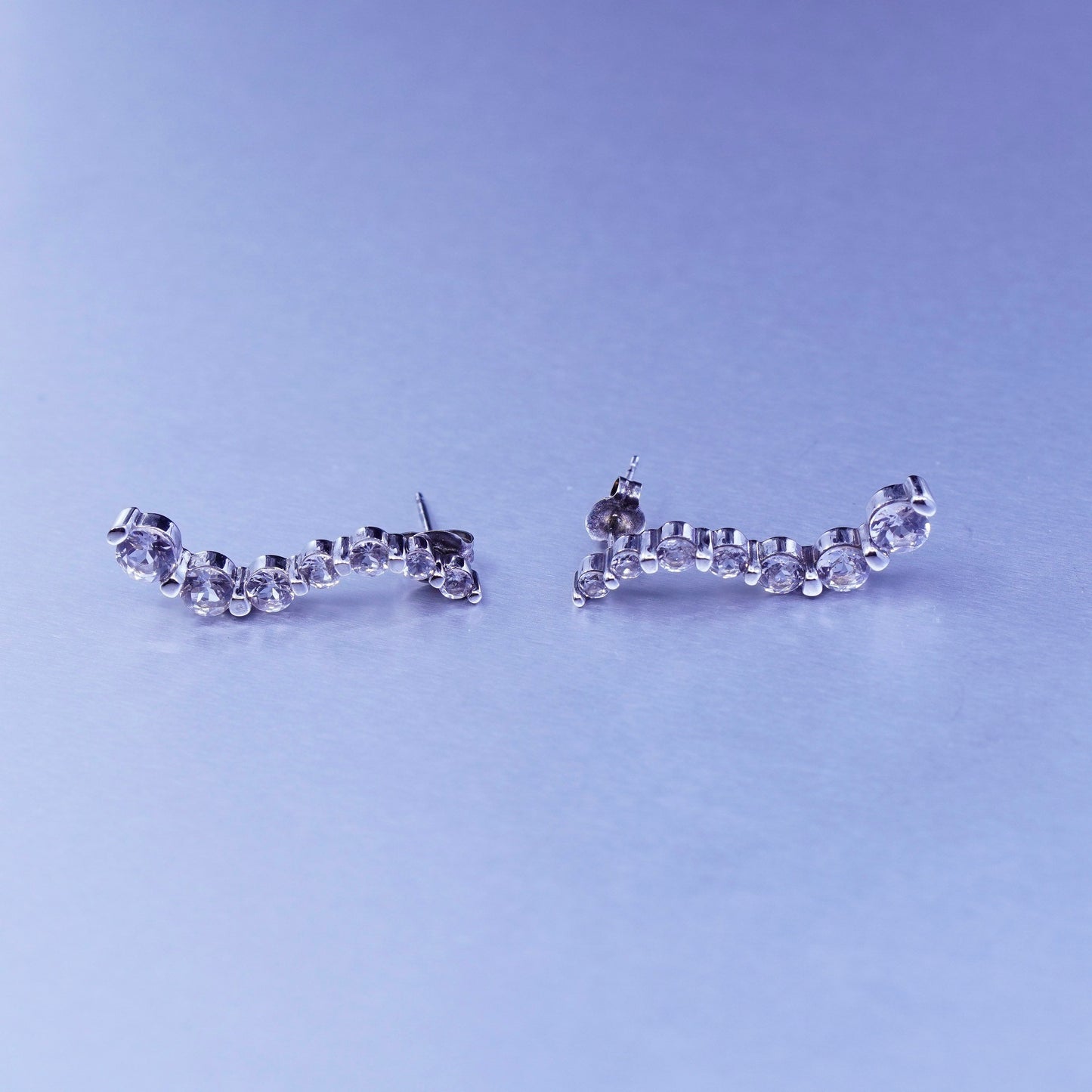 Vintage Sterling 925 silver earrings, wavy studs with Cz inlay
