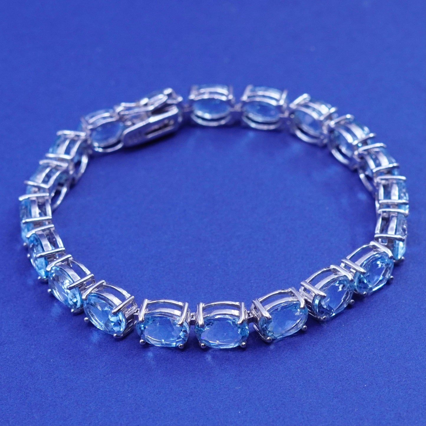 7.25”, vintage Sterling 925 silver tennis bracelet with topaz