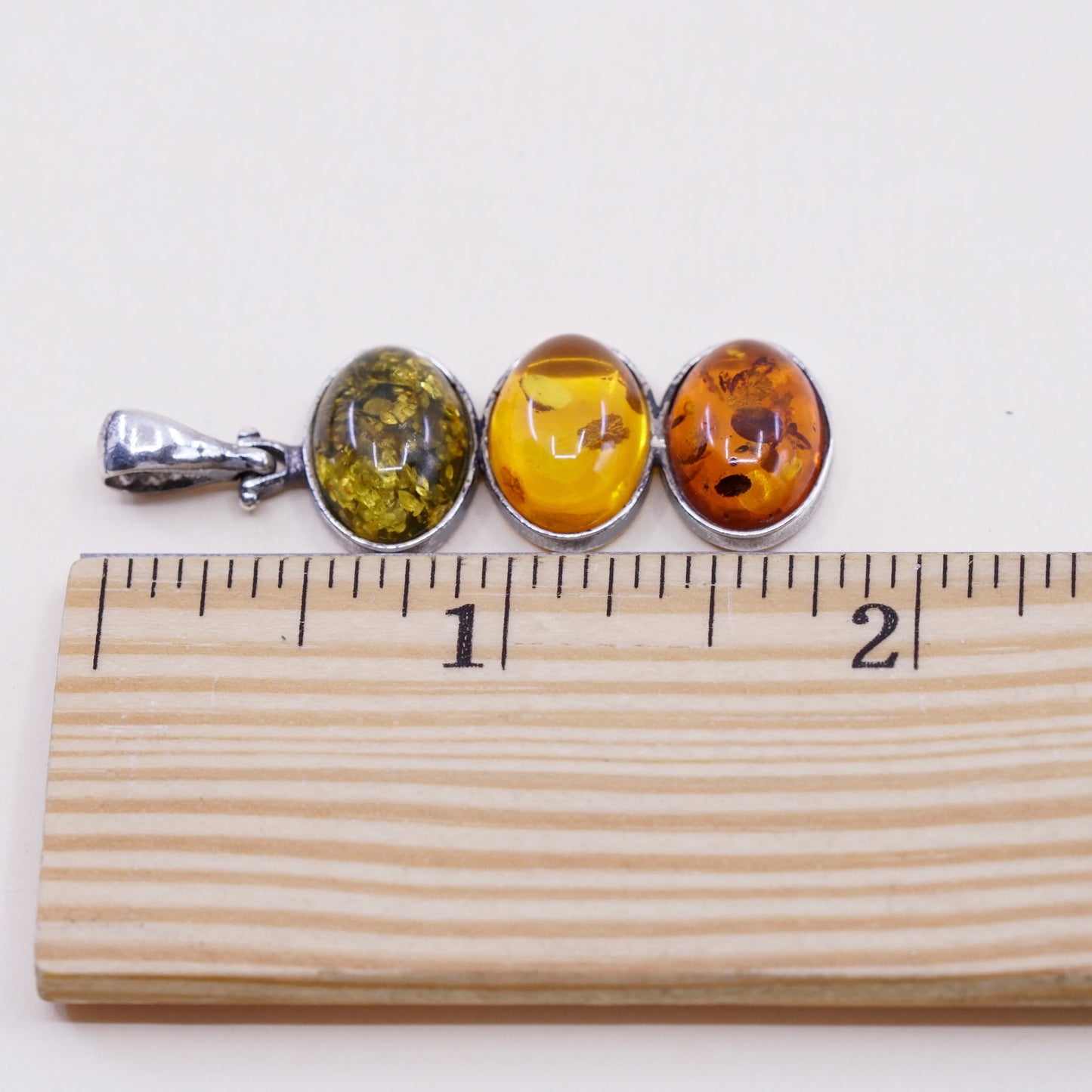 Vintage sterling 925 silver handmade pendant with oval amber