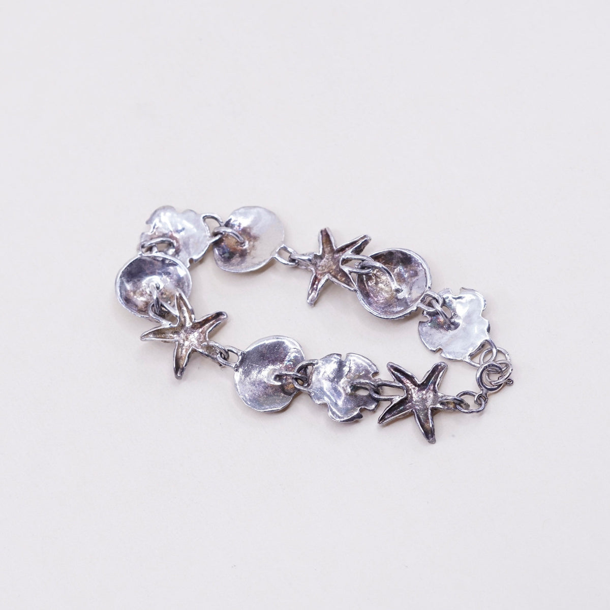 6.75”, ocean lover Sterling silver bracelet, 925 sand dollar, shell, starfish