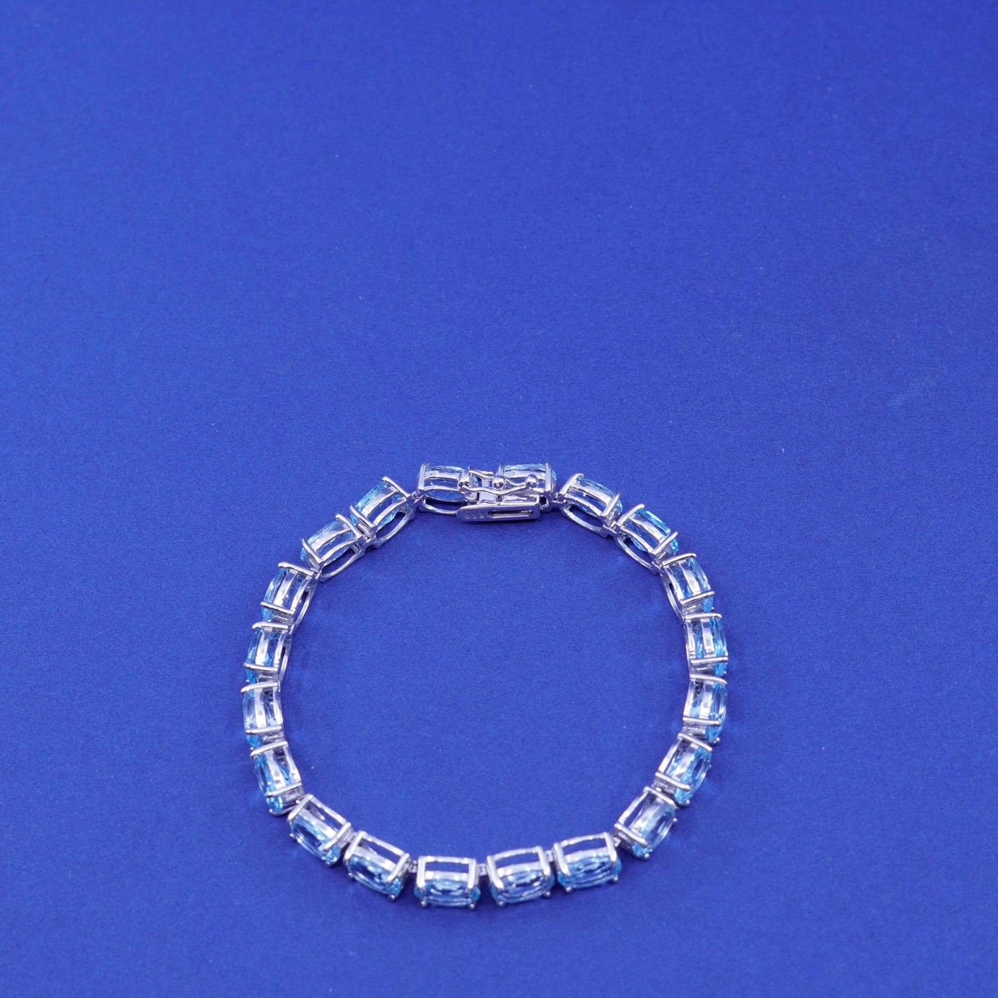 7.25”, vintage Sterling 925 silver tennis bracelet with topaz