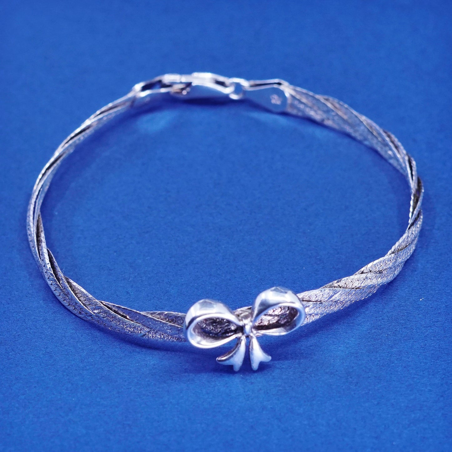 7”, Sterling silver handmade bracelet 925 twisted herringbone w/ bow tie ribbon
