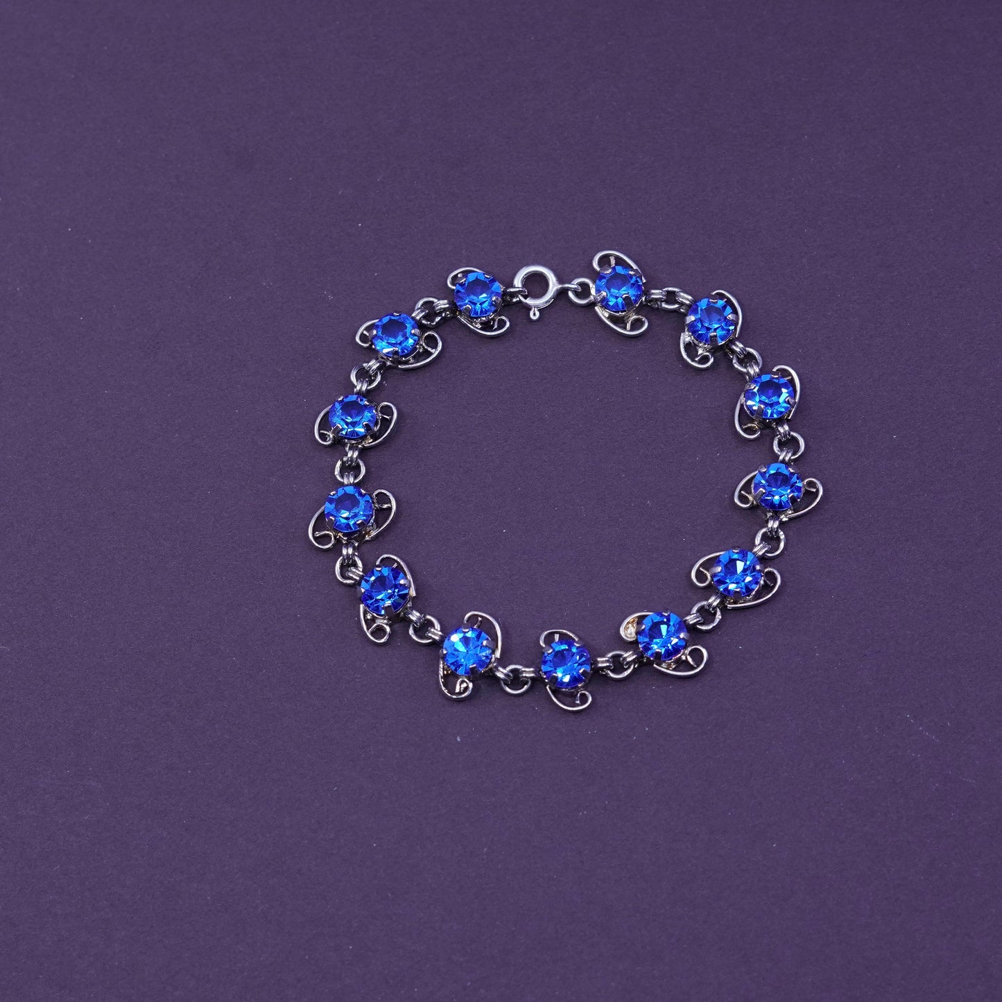 6.75”, vintage Sterling 925 silver handmade bracelet with blue topaz inlay