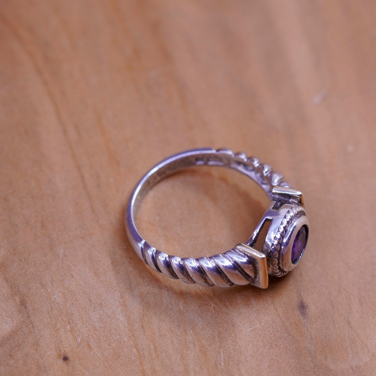 Size 8.25, 14K yellow gold with Sterling silver ring, 925 band with amethyst