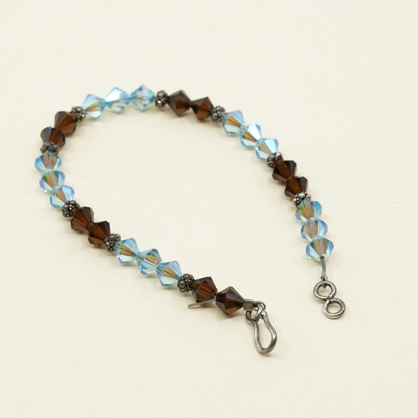 7.5”, VTG Sterling silver handmade bracelet w/ brown N blue Swarovski crystal