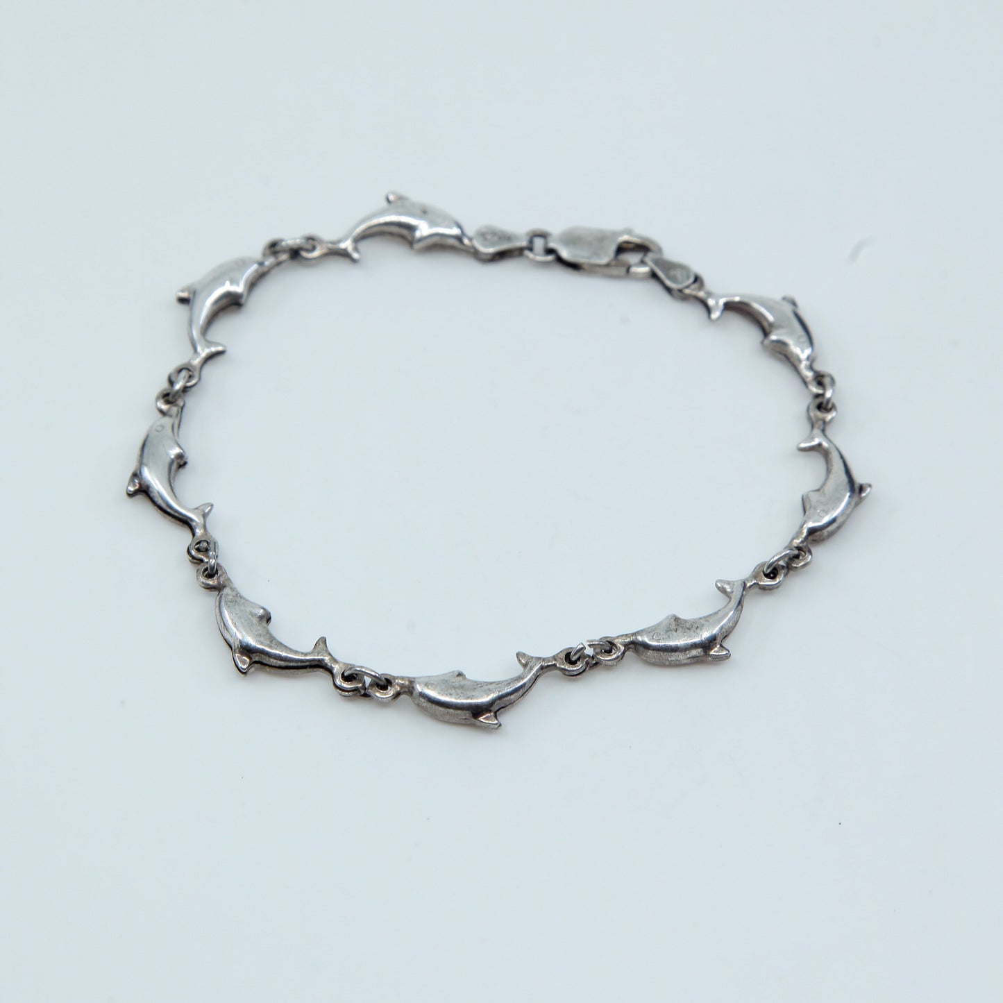 7.", VTG Sterling silver handmade bracelet, solid 925 silver dolphin links
