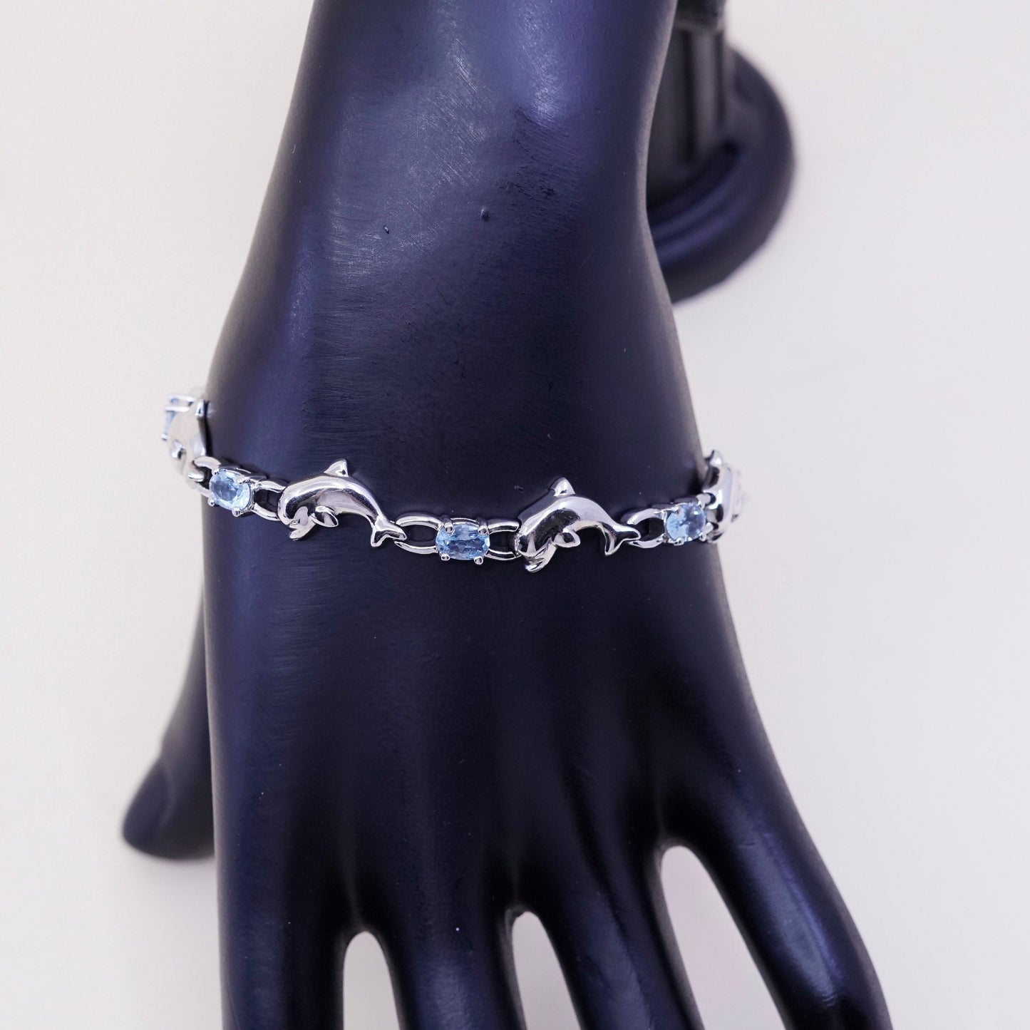 7.25”, vintage Sterling silver handmade bracelet, 925 dolphin links with topaz