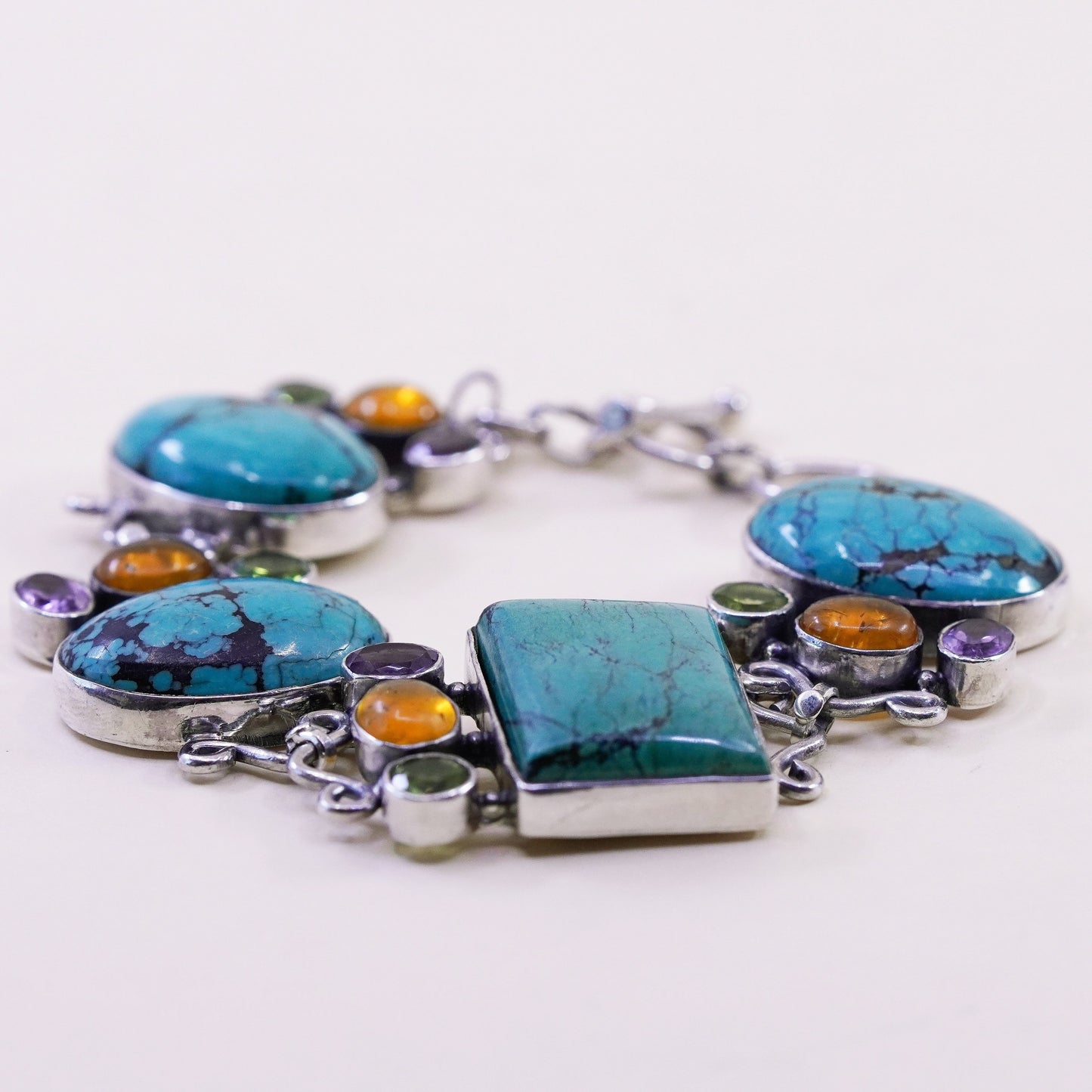 7.25”, southwestern Sterling 925 silver bracelet with dry creek turquoise amber