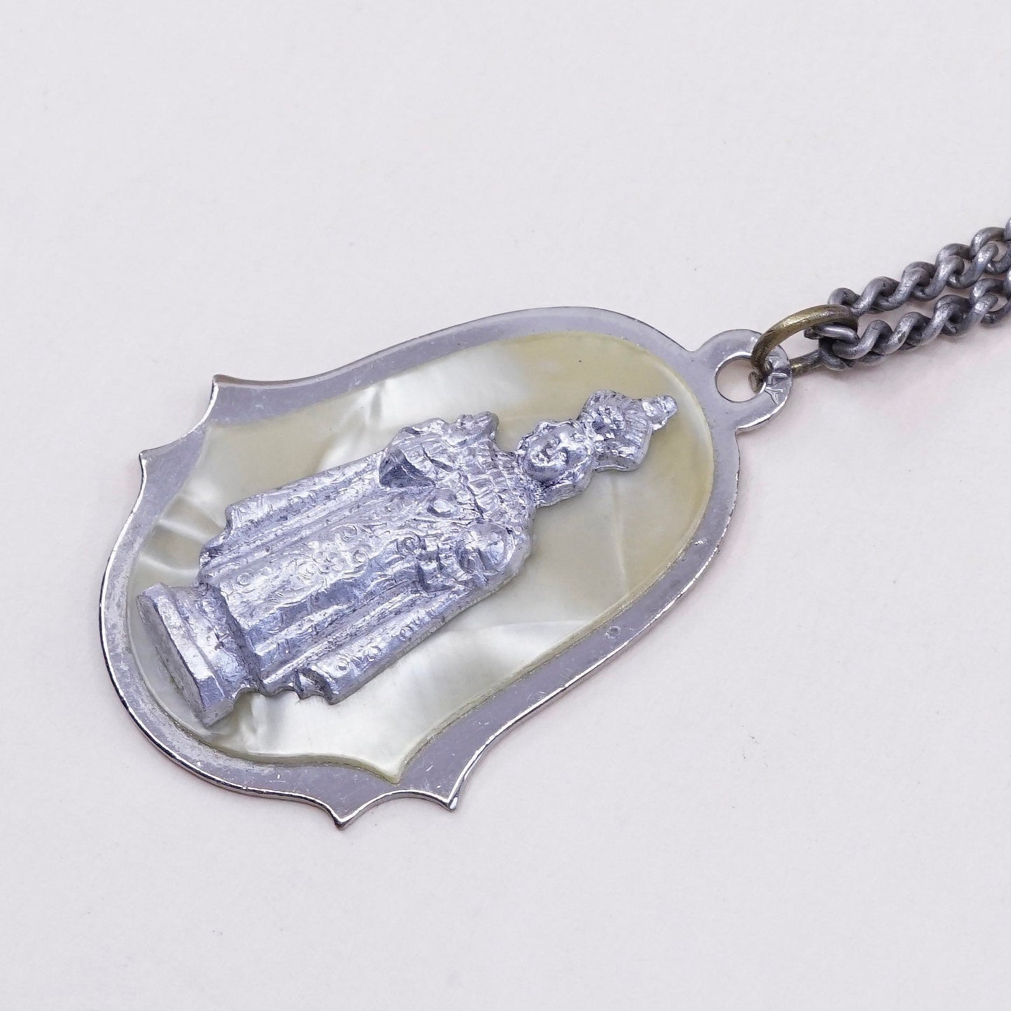 24”, vintage silver tone necklace with “queen” pendant
