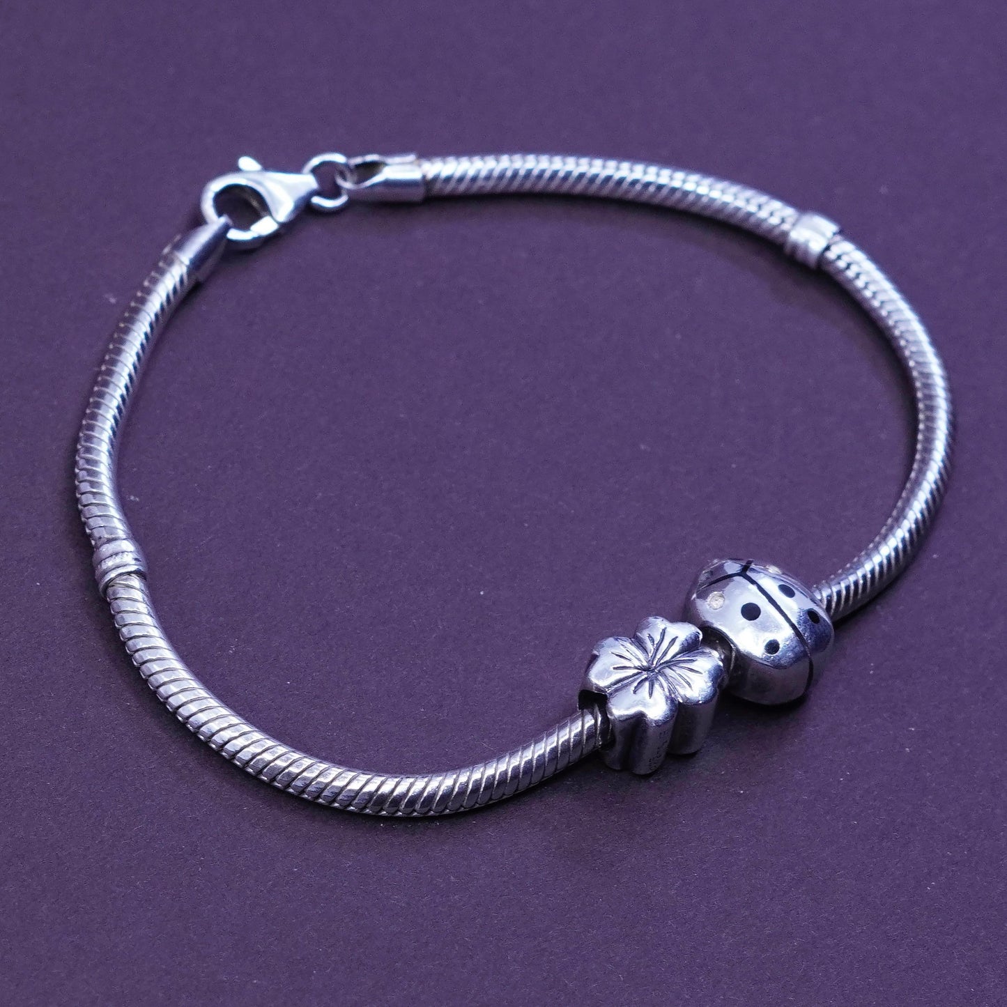 7.25”, Sterling silver snake chain, 925 bracelet w/ lady bug and flower charms