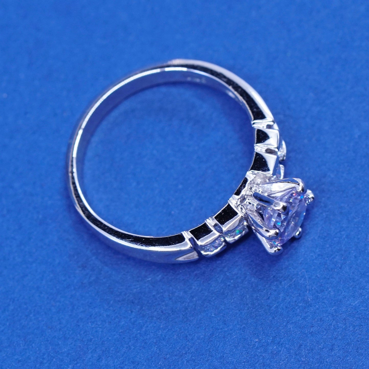 Size 7.25, vintage Sterling 925 silver engagement ring with clear cz stones