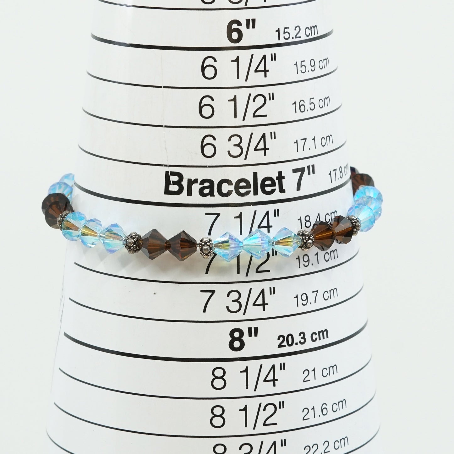 7.5”, VTG Sterling silver handmade bracelet w/ brown N blue Swarovski crystal