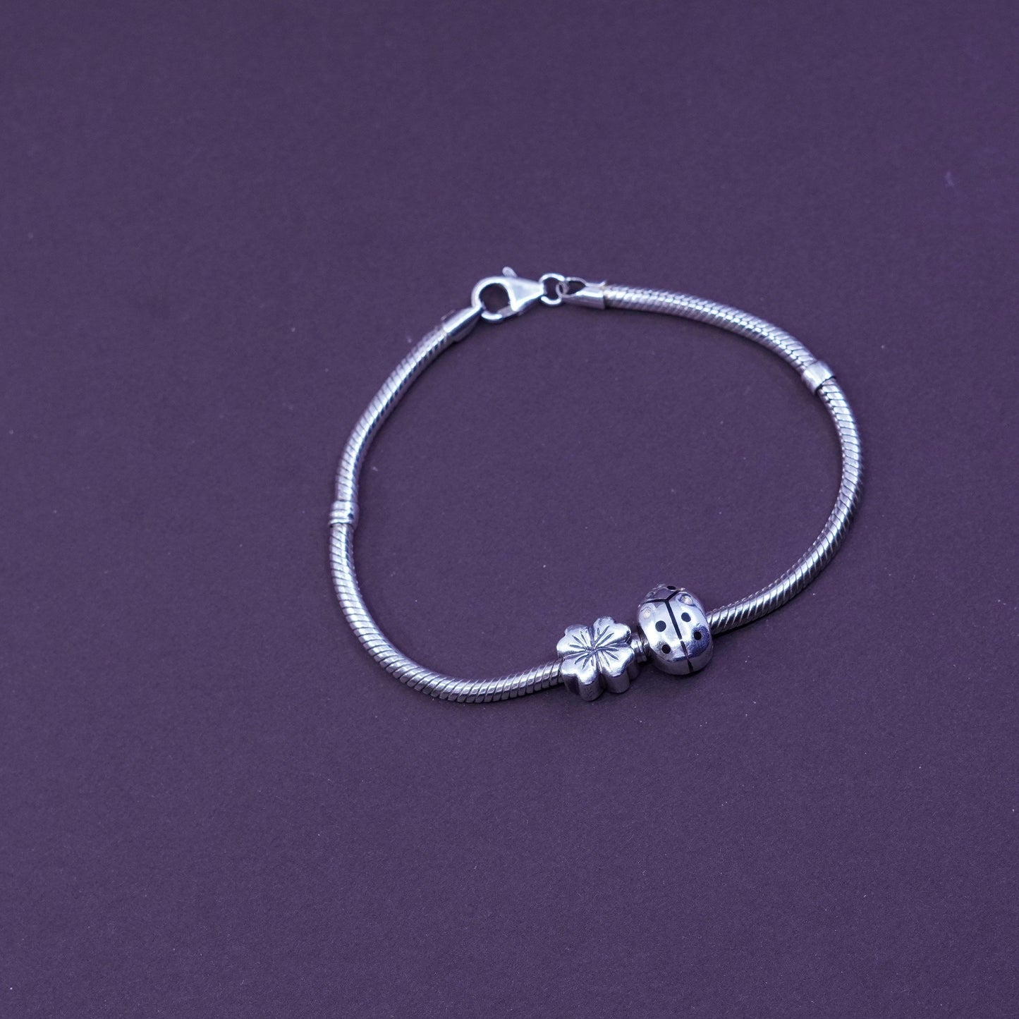 7.25”, Sterling silver snake chain, 925 bracelet w/ lady bug and flower charms