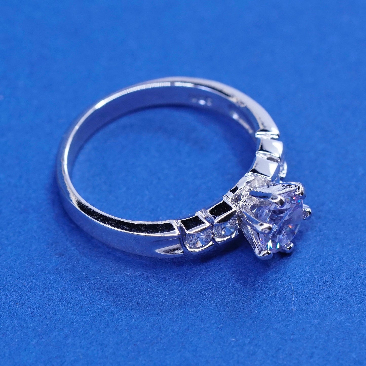Size 7.25, vintage Sterling 925 silver engagement ring with clear cz stones