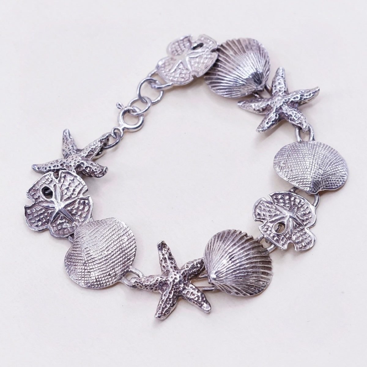 6.75”, ocean lover Sterling silver bracelet, 925 sand dollar, shell, starfish