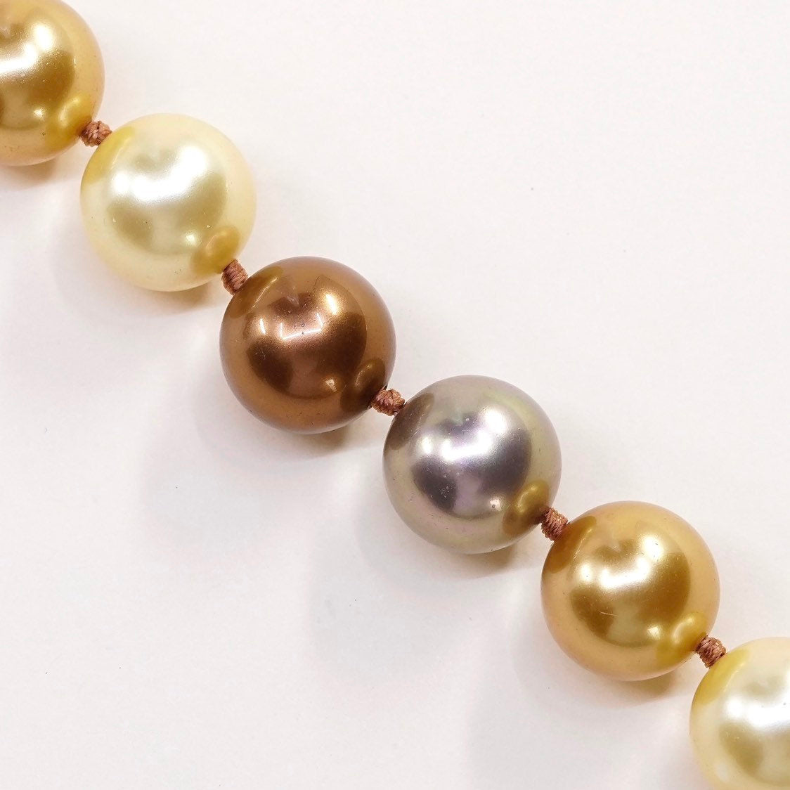 6.5”, Vintage handmade bracelet, gold and earth tone pearl beads w/ 925 clasp