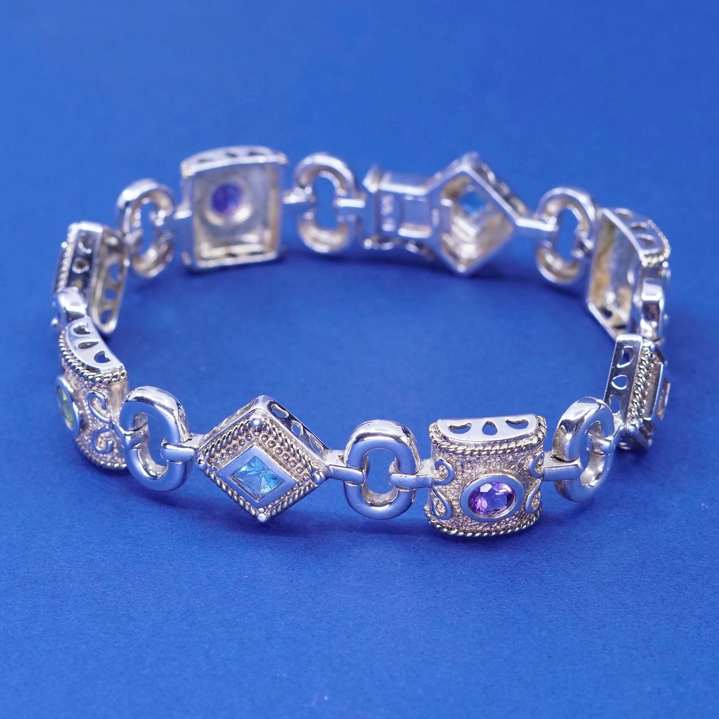 7”, Sterling 925 silver tennis bracelet w/ amethyst, peridot ruby citrine topaz