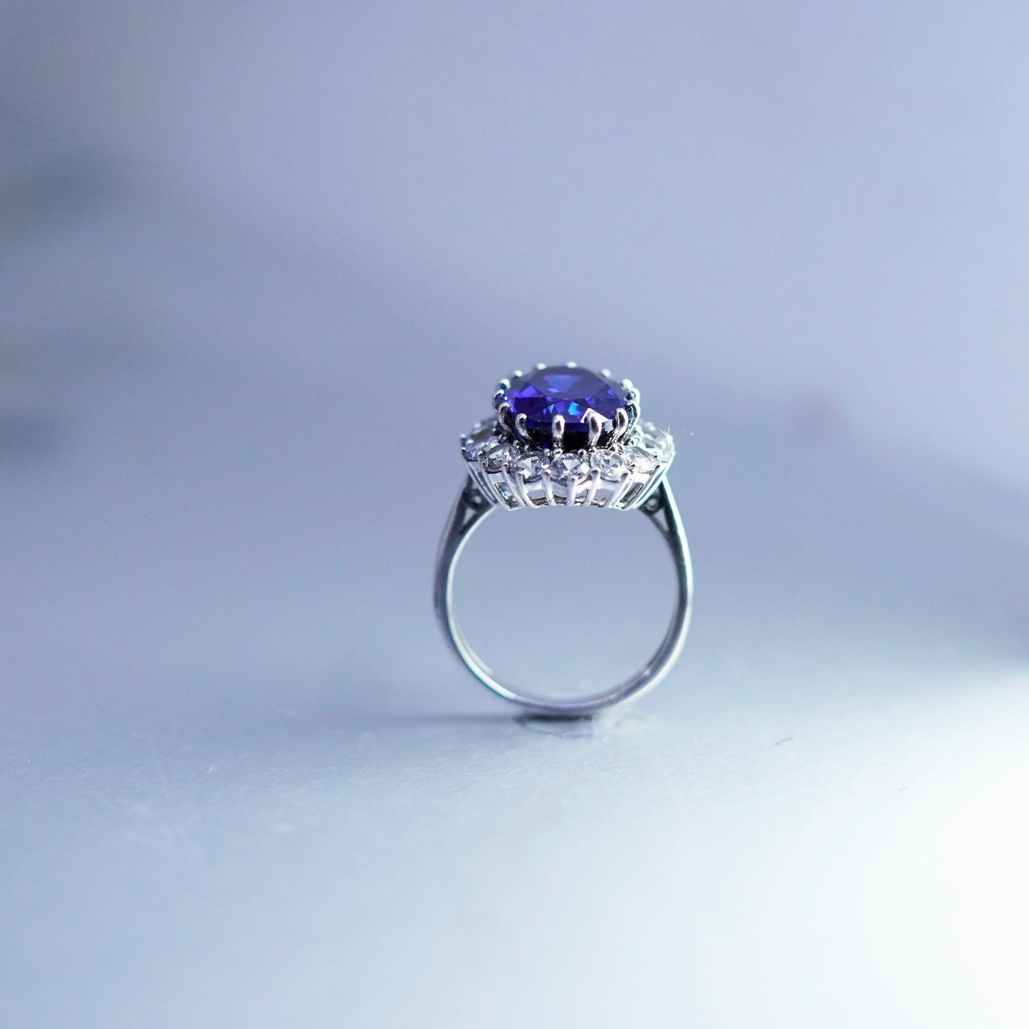 Size 7, vintage Sterling 925 silver handmade ring with sapphire and cz around