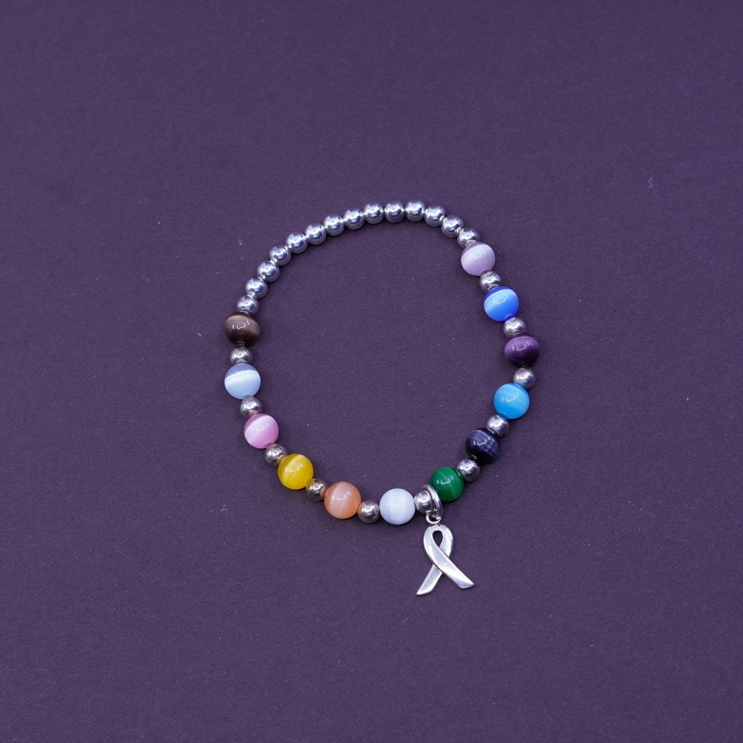 6”, Sterling 925 silver bracelet, elastic band with colorful cat eyes and beads