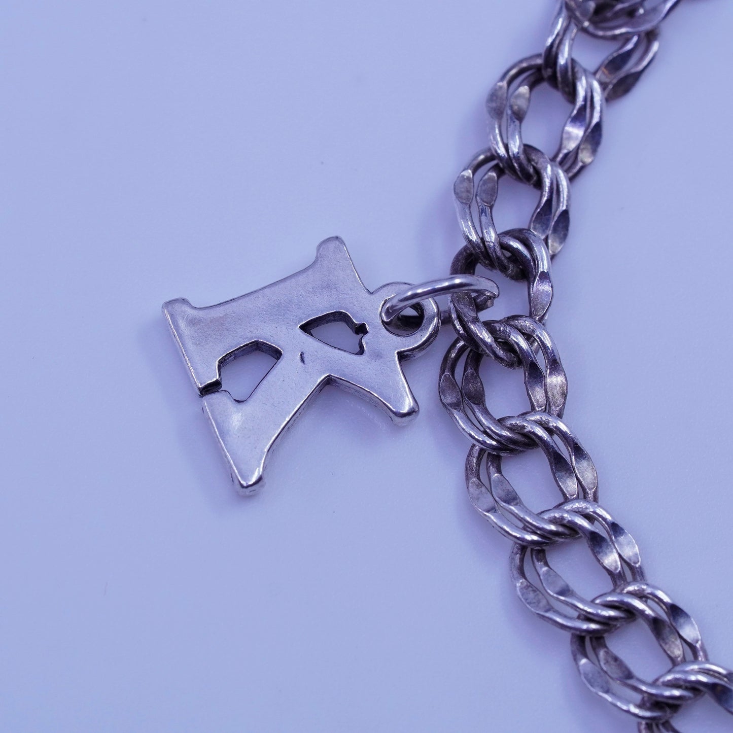 7.5”, Sterling 925 silver bracelet, curb chain K pineapple riding boot charms